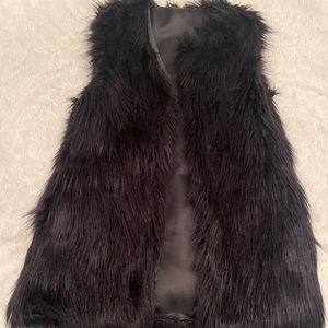 Womens black fur vest from boutique